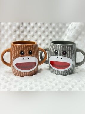 Galerie’s Cheerful Monkey Mugs - 1 brown monkey mug 1 gray monkey mug